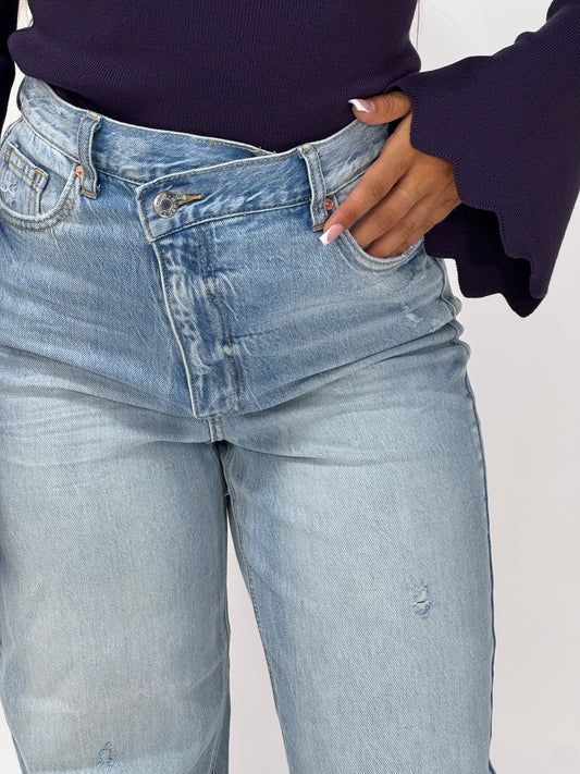 JEANS BOTTONCINO ASIMMETRICO